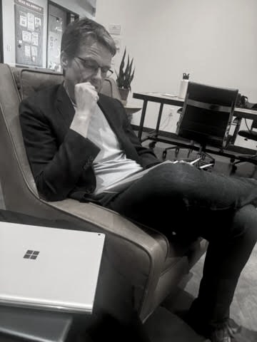 Dan Hughes — portrait of the founder of IXSOR, an AI implementation consultancy for legal practitioners